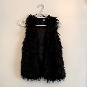Black faux fur vest